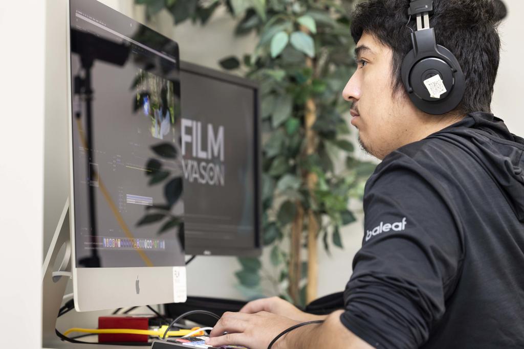 Film student editing in Cortez Lab