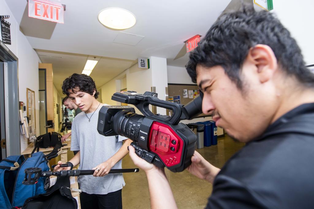 Students using film equipment